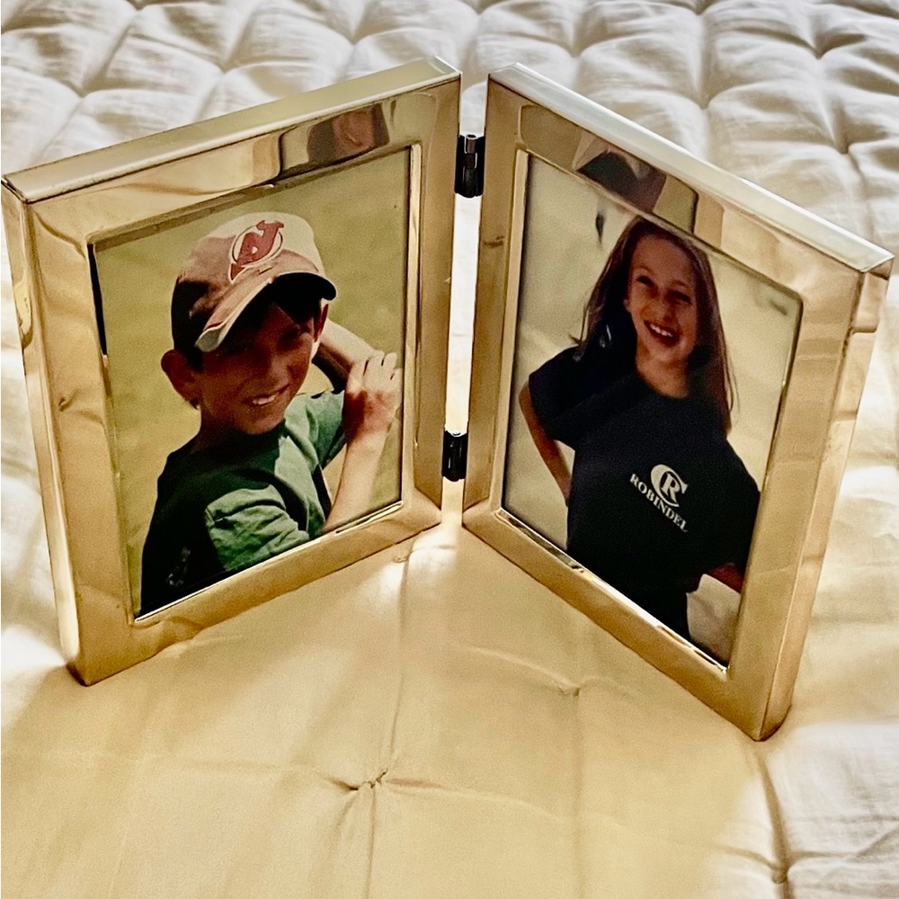 Foldable Double silver plate frame.